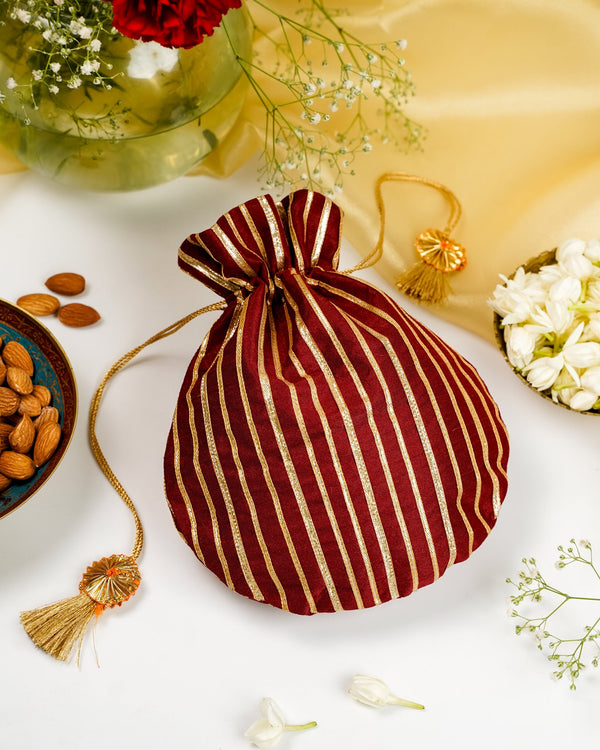 Saaj Silk & Gota Work Potli image 0