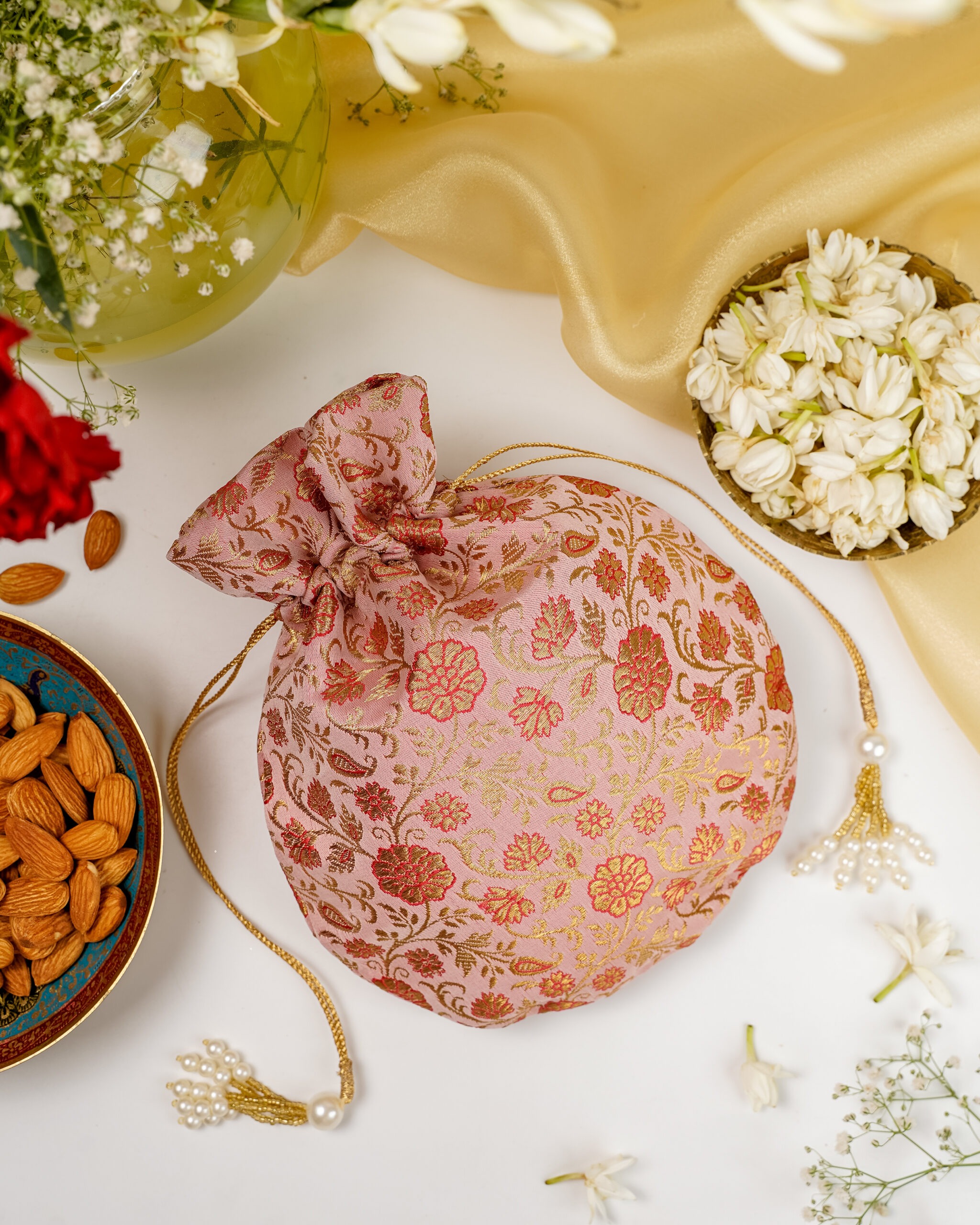 Bahaar Brocade Potli, a potli perfect for holding small wedding essential.