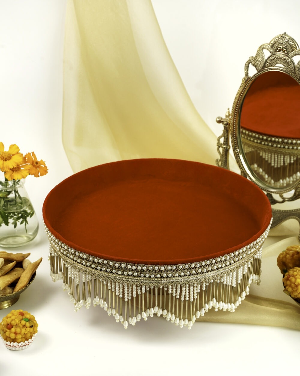 Elegant Sindoori Shagun Thaal by Navka Studio, featuring a rich red velvet base and intricate pearl and gold detailing, perfect for traditional ceremonies.