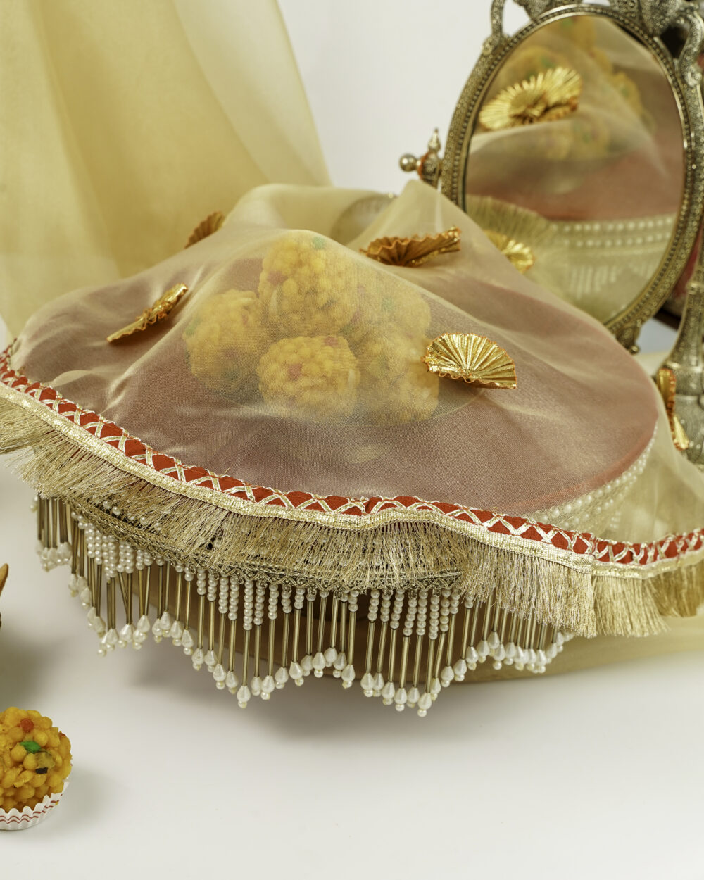 Sindoori Shagun Thaal with Cover by Navka Studio, beautifully decorated with pearls, golden fringe, and red velvet base, showcasing traditional Indian festive design.