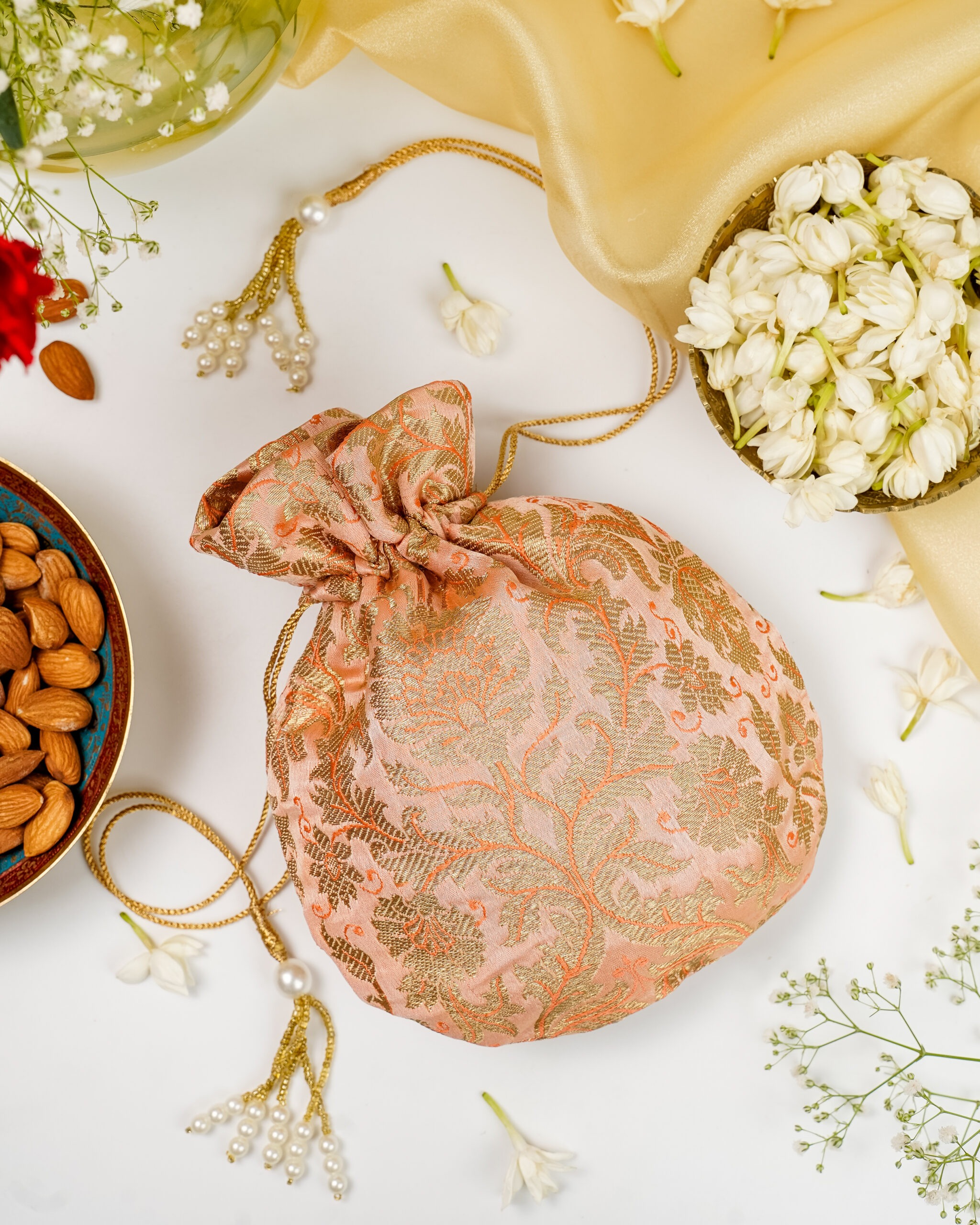 Meher Brocade Potli, a potli perfectly fit for ethnic wear in weddig functions.