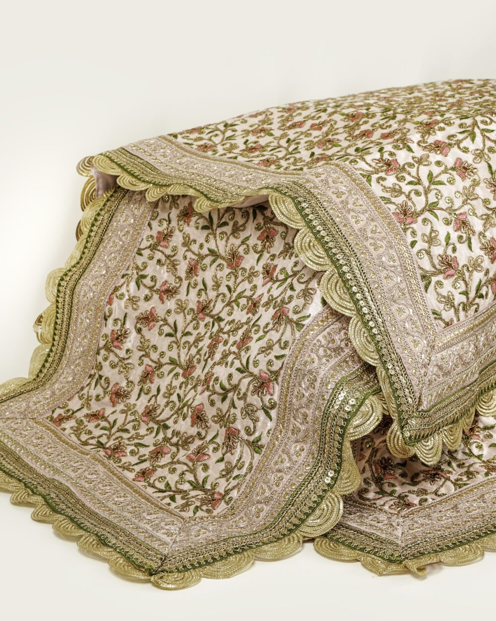 The elegant Bahaar Rumala Sahib by Navka Studio, featuring intricate floral patterns and a rich golden-green border.