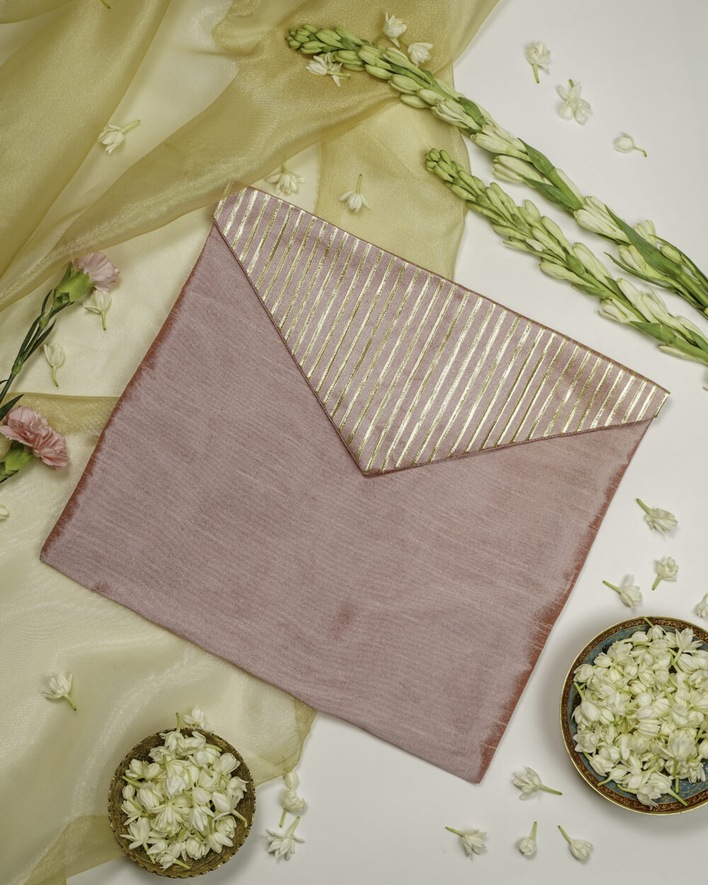 The spring-themed Bahaar Silk Full Gota work Trousseau Bag from Navka Studio.