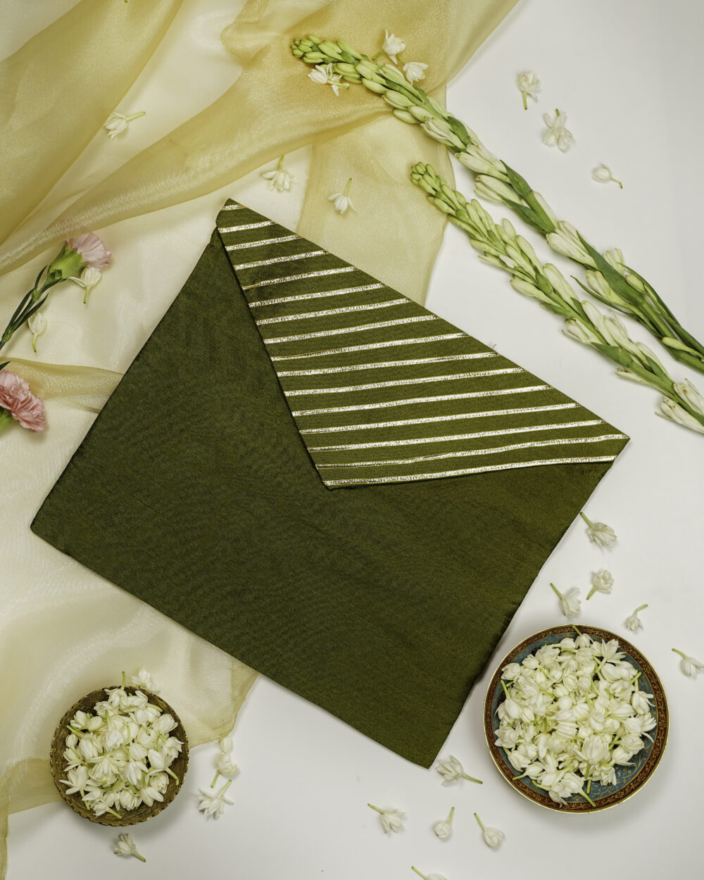 The Saawan Silk Full Gota work with Gold trims Trousseau Bag in a monsoon theme by Navka Studio.