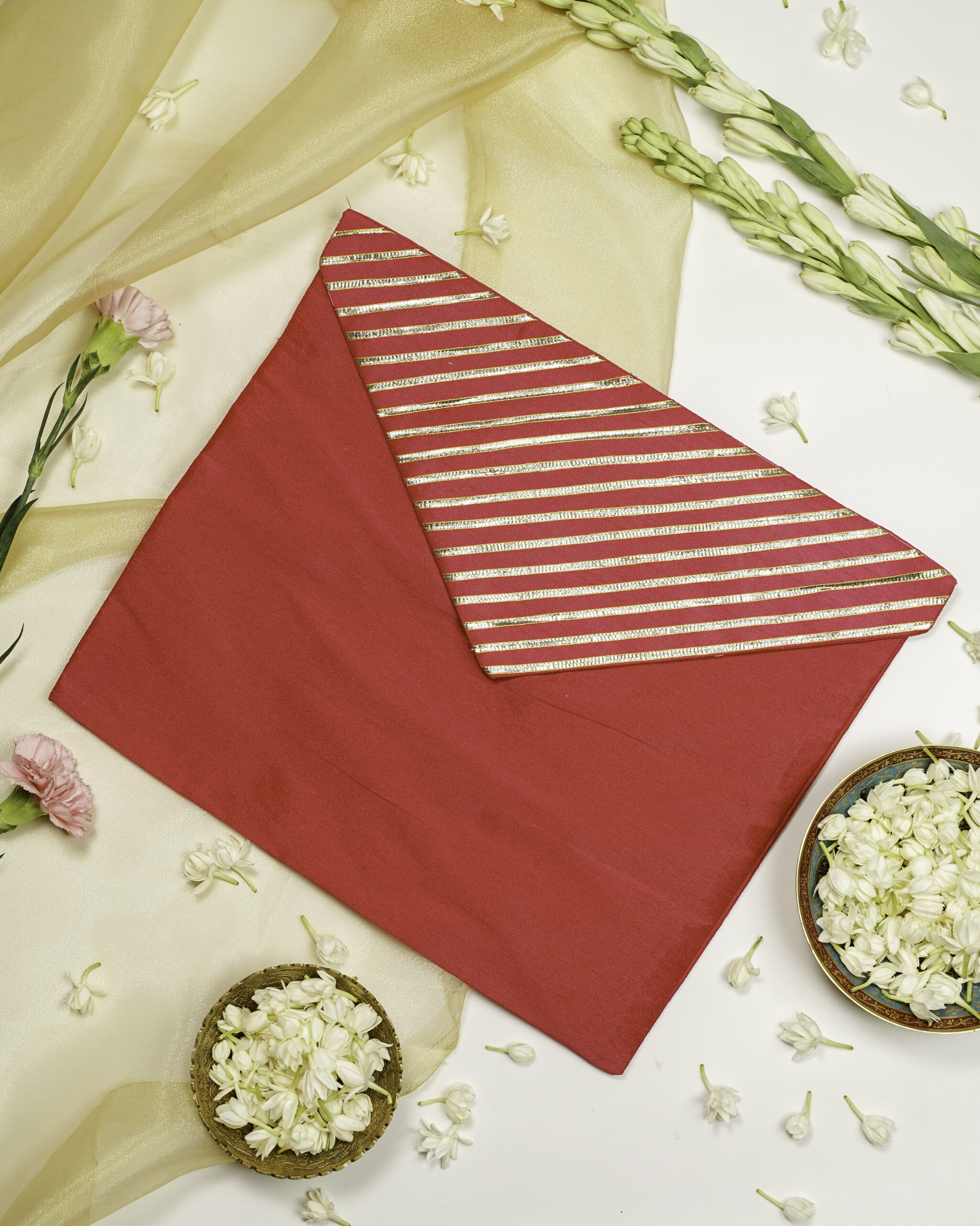 The Gulzaar Silk Full Gota work Trousseau Bag with a vibrant floral design from Navka Studio.