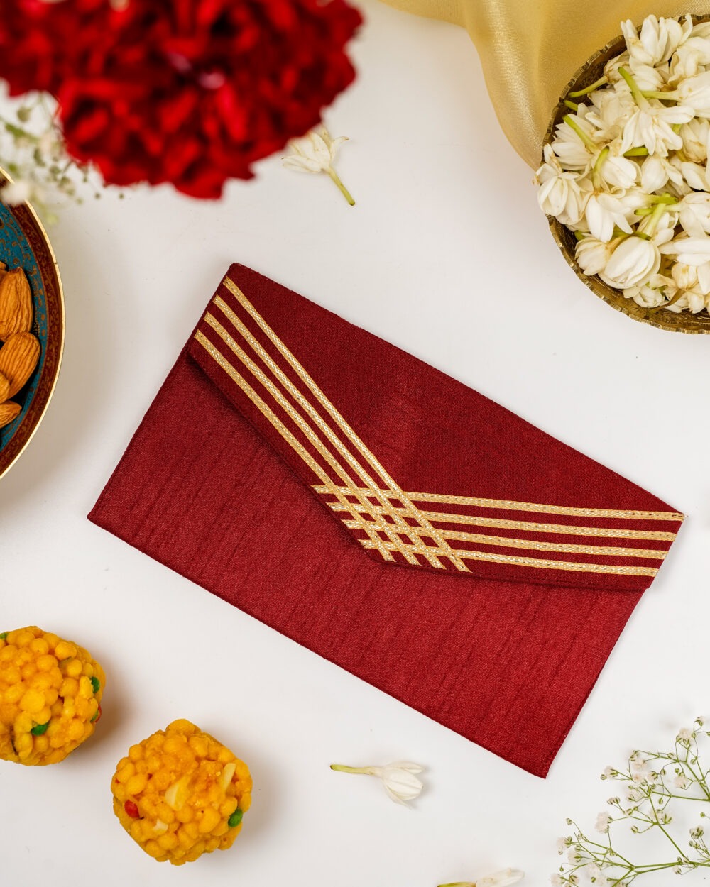 The Saaj Grid Gota Work Shagun Envelope by Navka Studio featuring a unique golden grid pattern.