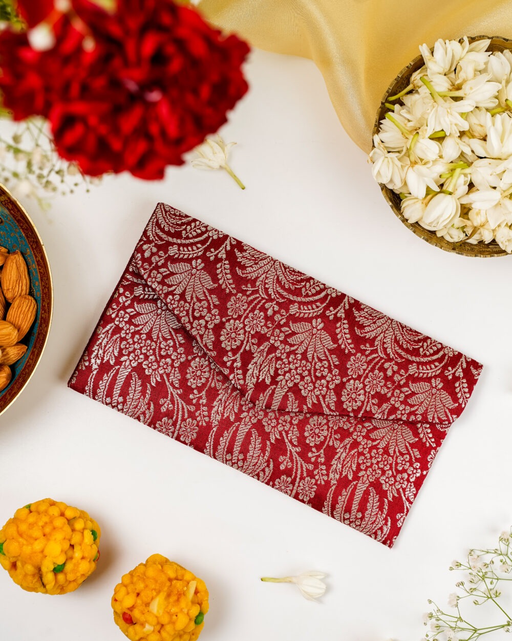 The luxurious Saaj Brocade Shagun Envelope by Navka Studio, perfect for wedding gift giving.