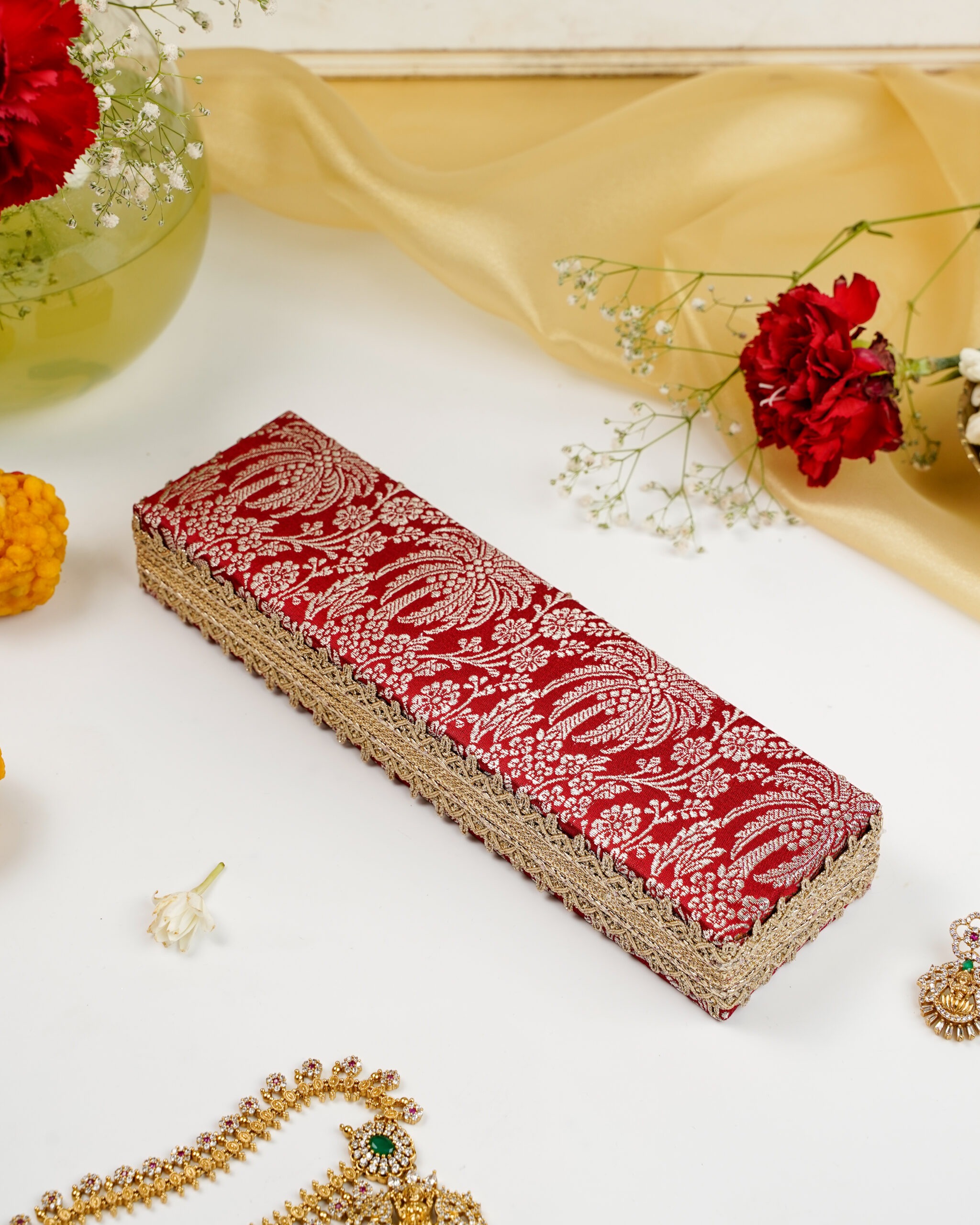 The Saaj Brocade Chain Box by Navka Studio, an elegant storage solution for necklaces.