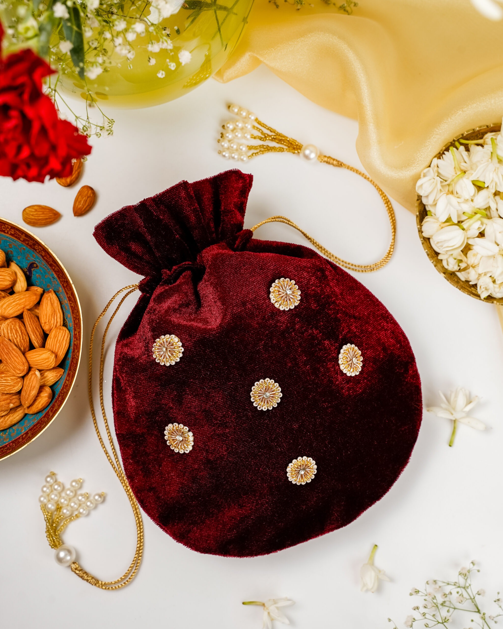 The chic Saaj Small Velvet Potli by Navka Studio, a compact and decorative potli for essentials.