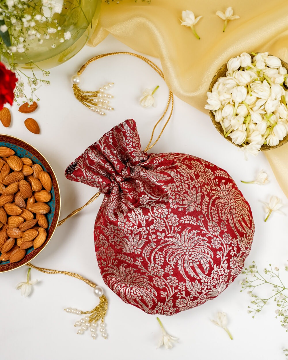 Saaj Brocade Potli for holding small wedding essentials.