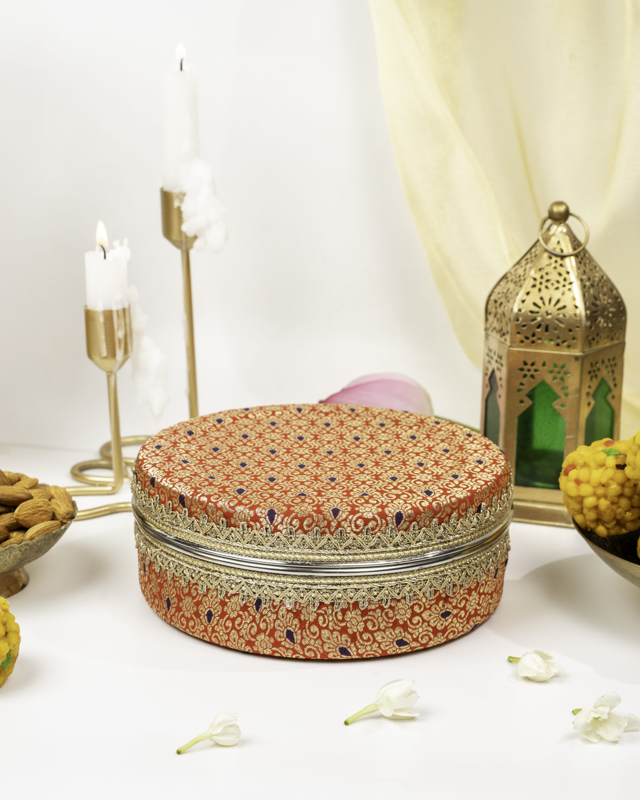 Sindoori Brocade Ladoo Box Small, a wedding product used in Indian weddings for storing sweets and gifting purposes by Navka Studio