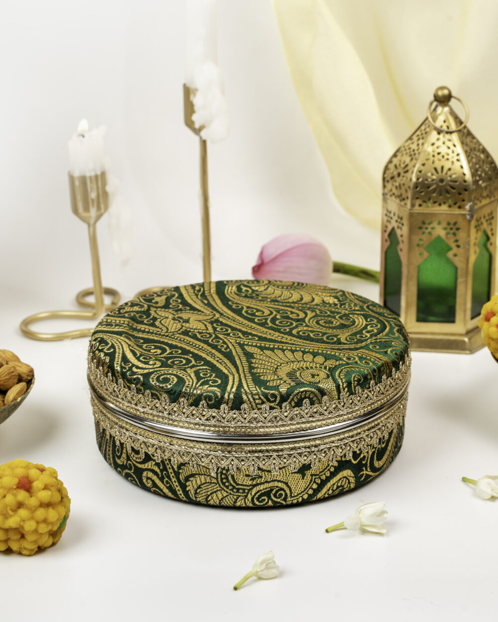 Baagh Brocade Ladoo Box Small, a wedding product used in Indian weddings for storing sweets and gifting purposes in wedding functions, presented by Navka Studio.